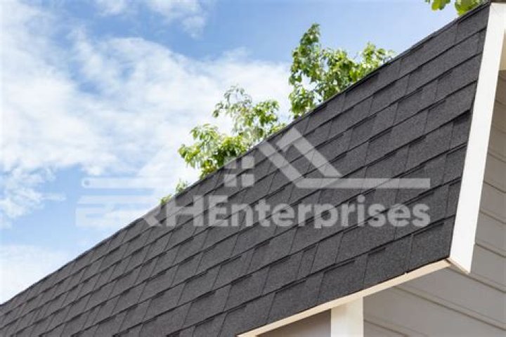 When were laminated shingles invented?