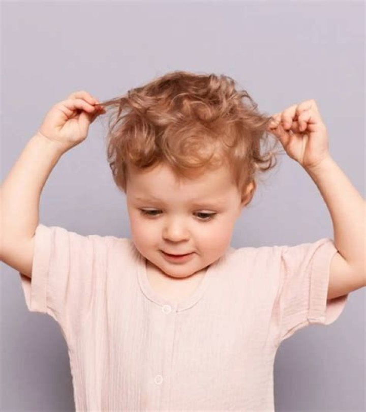 Who do babies pull their hair?